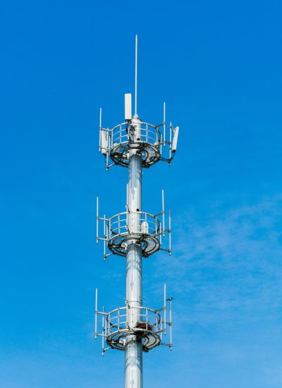 Communications tower with a beautiful blue sky